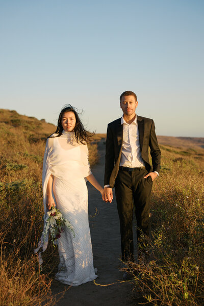 candid groom laughing with groomsmen before the wedding