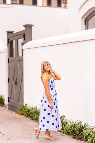 Charleston high school senior portrait in historic streets capturing joyful, timeless personality