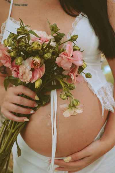Maternity photography session in the Arizona desert, capturing strength, beauty, and warmth.