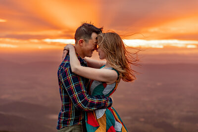 man hugging woman from behind