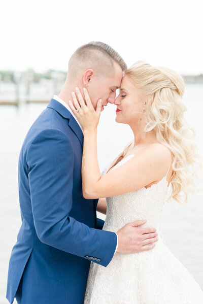 bride and groom touching noses