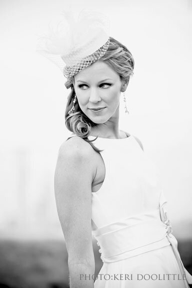 vintage bride with a pillbox hat veil and updo and makeup