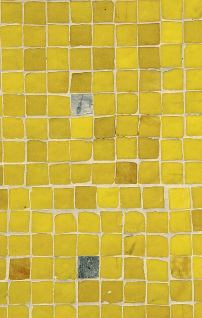 Small square tile in the color yellow