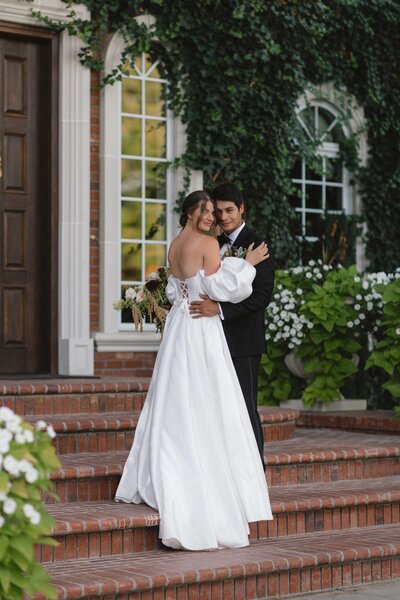 Styled shoot at Oakshire Estate and Airfield , WA. Couple in wedding attire embracing