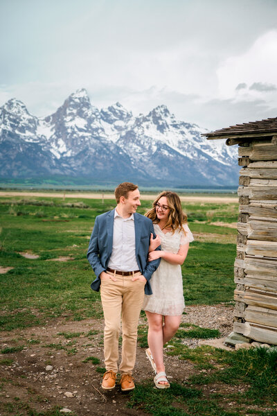 Jackson Hole photographers capture couple walking through cabin