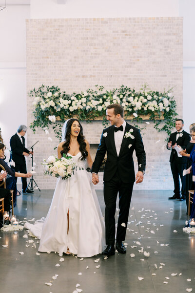 indoor ceremony with fireplace Ellie McKinney Photography