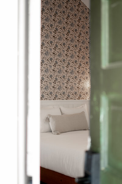 Hampton Roads luxury inn bed with white linens - hospitality photography