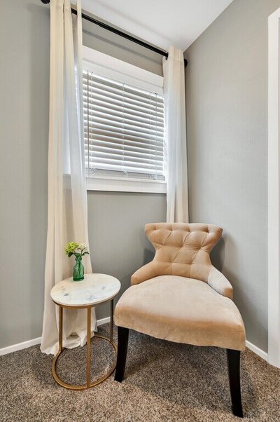 Reading nook in the master bedroom of this Entry way of this three-bedroom, two-bathroom vacation rental home featured on Chip and Joanna Gaines' Fixer Upper located in downtown Waco, TX.