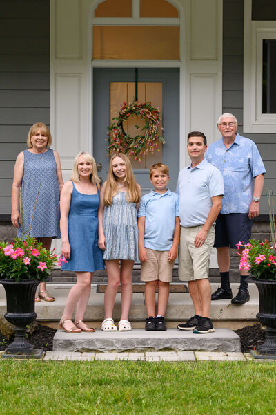 Extended family photo with mom and dad, son and daughter, and grandma and grandpa for their extended family photos.
