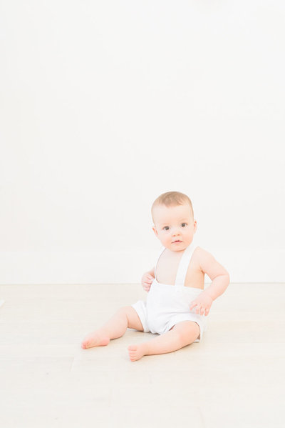 baby-boy-white-overalls-white-sudio-one-year-old-1