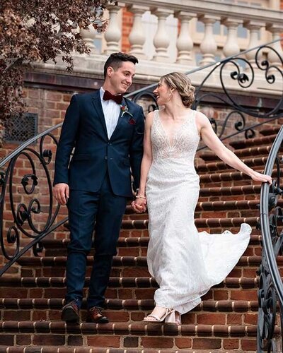 Newly wed couple at maymont wedding pose for photographs