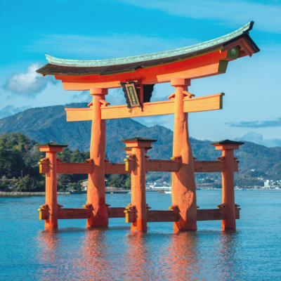 An image of the Itsukushima Shrine in Japan, one of the most famous torii (red gates) in the country