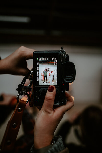Wedding Photographer taking a photo. 