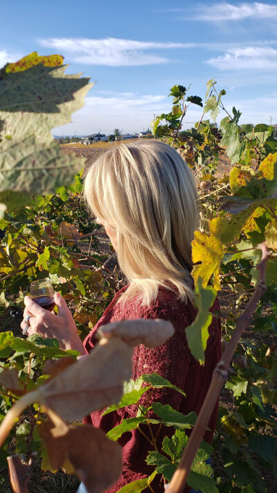Blonde Woman in Vineyard