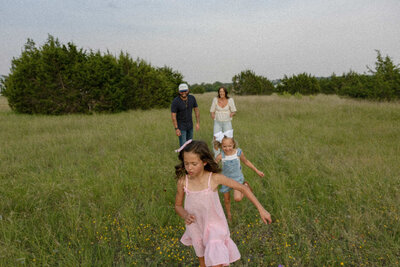 A family chasing each other in New Braunfels. 