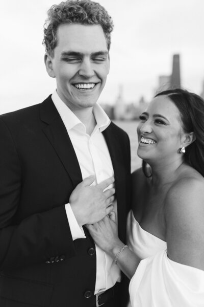 Couple about to kiss during an engagement session in downtown Chicago