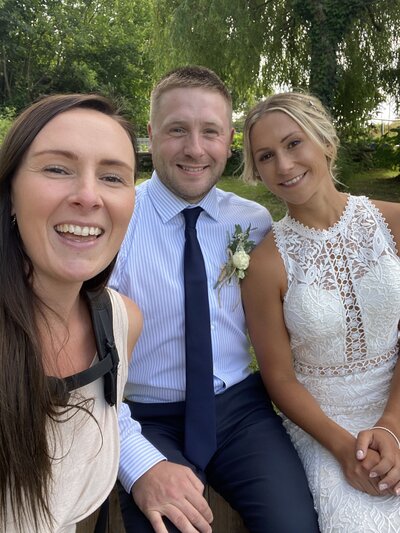 Amy & Nick posing with couple