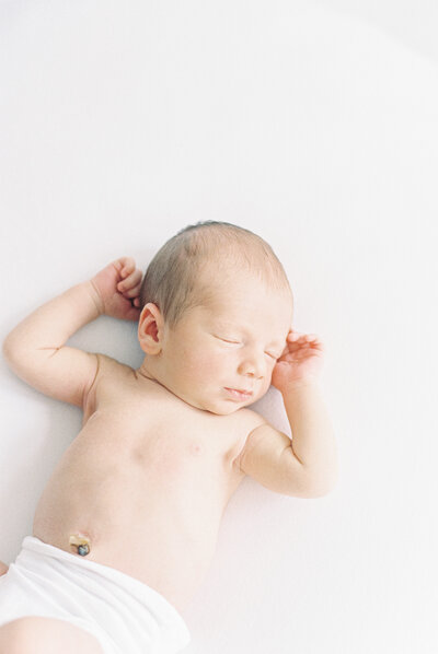newborn baby on white studio