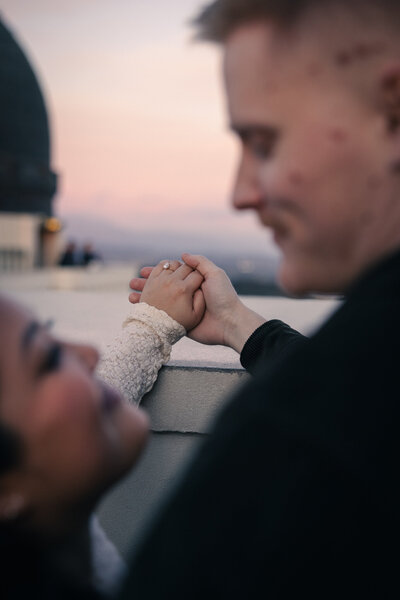 a bride and groom having fun at their wedding reception captured by Southern California film and digital documentary wedding photographer