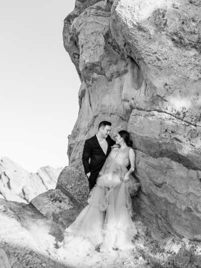 Engagement couple in dessert elopement editorial