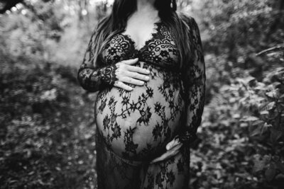 Pregnant Mom holding her belly Black and White Maternity Portrait