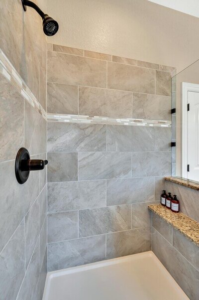Luxurious stand up shower in the master bathroom of this three-bedroom, two-bathroom vacation rental lake house that sleeps eight just steps away from Stillhouse Hollow Lake in Belton, TX.