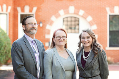 Bennett Law Group attorneys Michael, Patti, and Toni