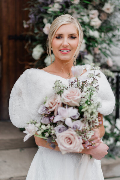 portrait of bride holding her bouquet