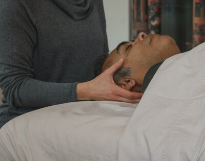 Upledger CranioSacral Therapy sphenoid technique.