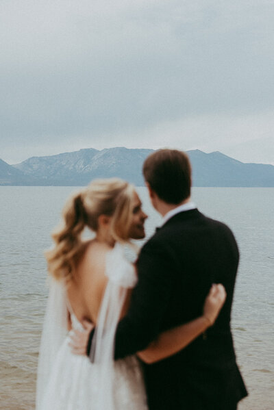 bride and groom smiling