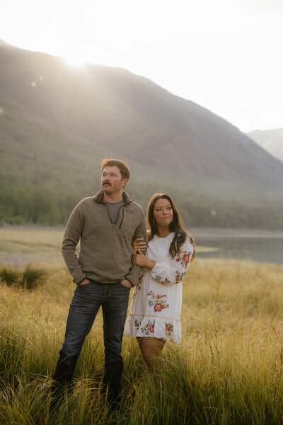 couple enjoys sunrise at Eklutna Lake
