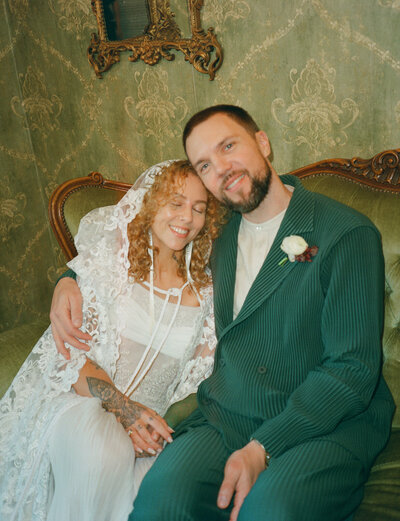 editorial photo of an LGBTQ couple and their getaway car at their black tie wedding at McCormick Home Ranch in Camarillo, CA captured by Los Angeles editorial wedding photographer