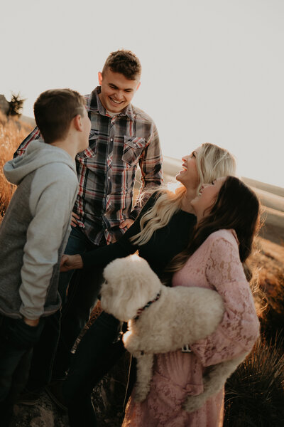 FAMILY WITH DOG IN BOWTIE