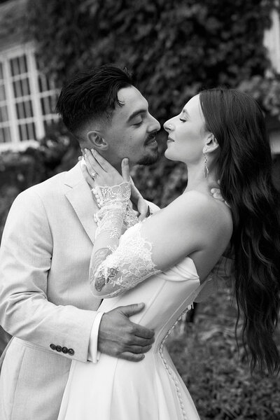a man and woman kissing in providence rhode island for their engagement photography session