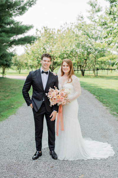Bride and groom walk up memorial steps at their DC wedding