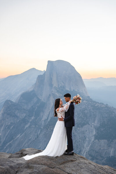 couple kissing in Glacier National Park taken by Montana elopement photographer Marcus Hanenburg Photography