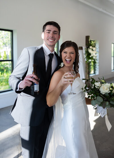 Bride and groom cheers their drinks after concluding their ceremony