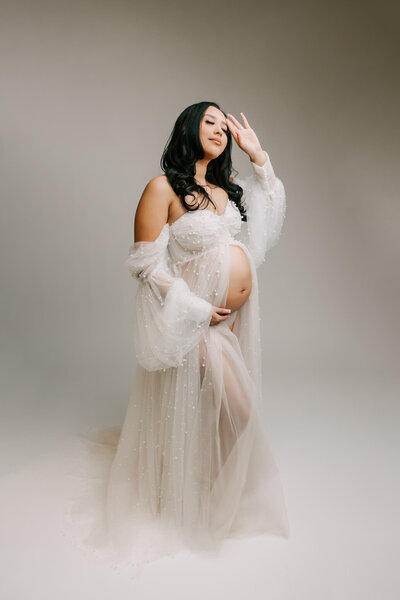 Pregnant mom in studio near Portland Oregon for her maternity photography session