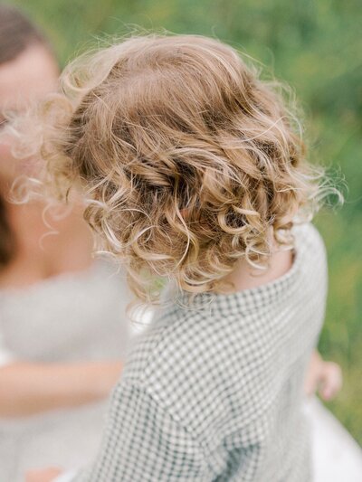 close-up-photo-of-little-boys-curls