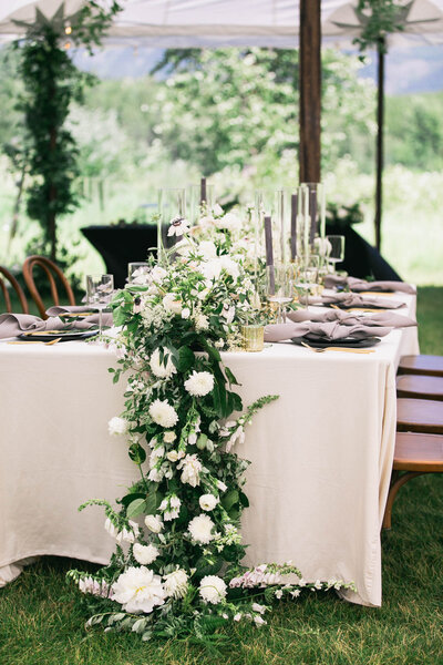 table setting with greenery