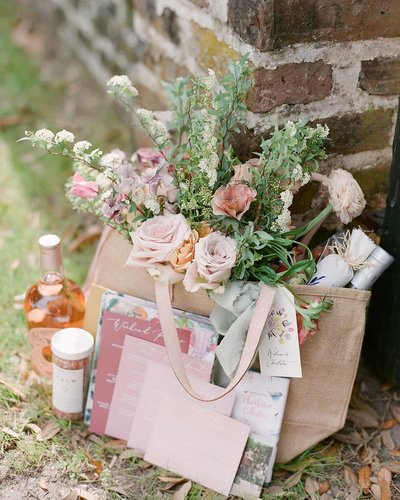 Seagrass tote wedding welcome gift with local treats including salt water taffy and sea salt scrub