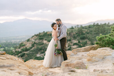 Lauren and Trey stand together at Palmer Park in Colorado for elopement