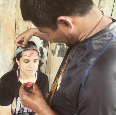 Traditional face paint with Achiote