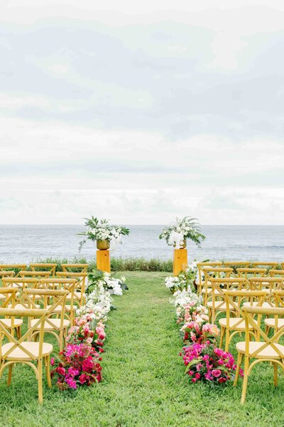 ombre floral wedding aisle overlooking the ocean in maui hawaii