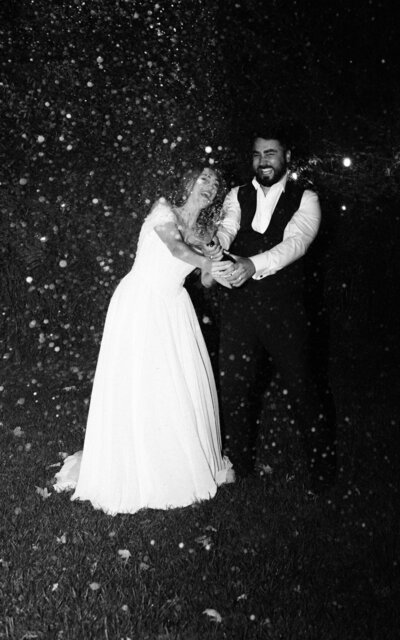 black and white wedding photography of bride and groom