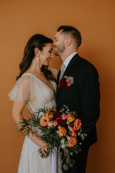 Colorful bride and groom wedding portrait