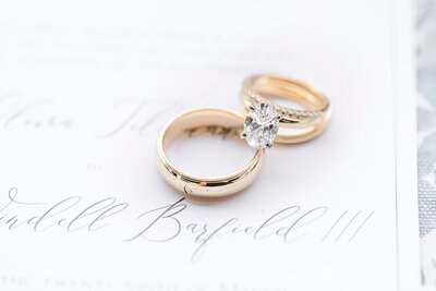Gold wedding bands on invitation | Birmingham Alabama wedding photographer Amanda Horne