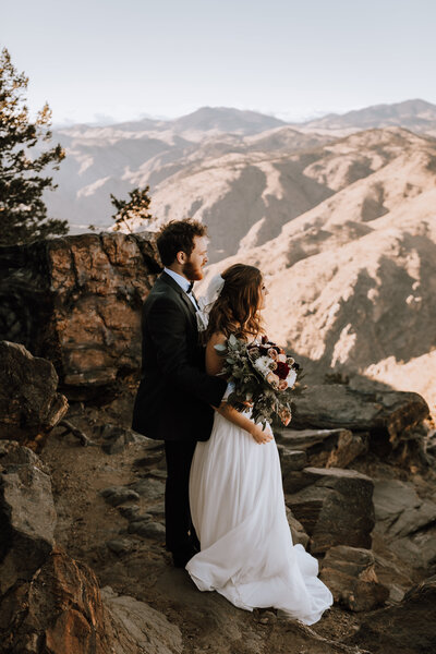 bride and groom mountain top Colorado views