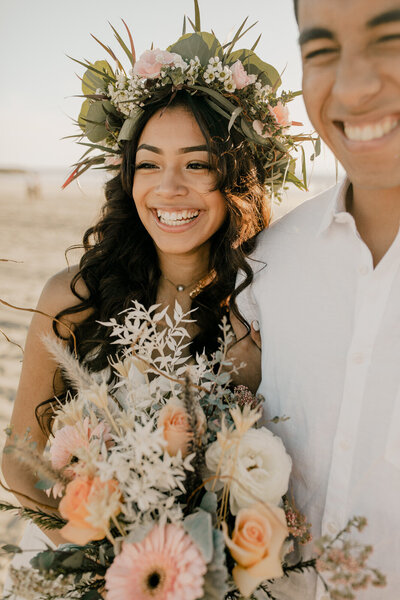 bride and groom holding each other