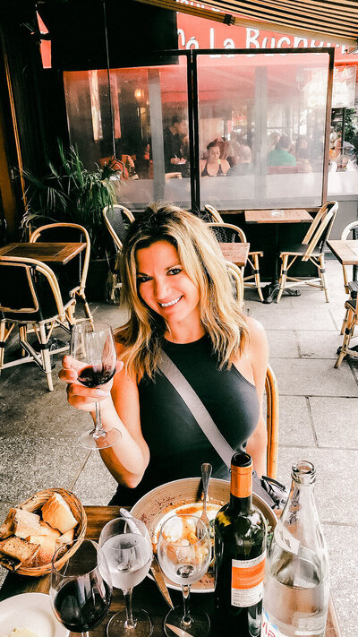 Sipping wine at an outdoor café in Paris